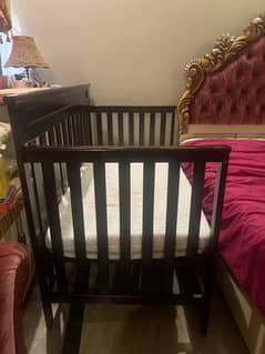 Wooden baby cot