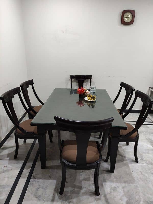 wooden dining table with 6 chairs 0