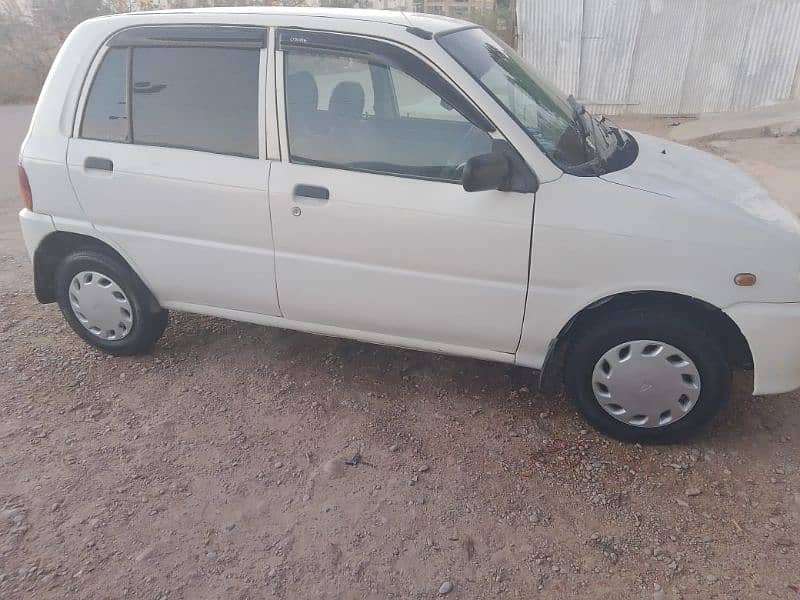 03102644070 Daihatsu Cuore 2004 full original condition hai 5