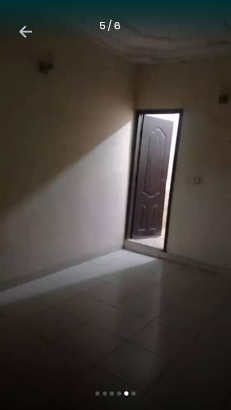 Like new 120yd 4bed dd 2 kitchen double story bungalow boundary wall near block7 jauhar 6