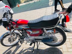 Honda 125 red 9000 driven only