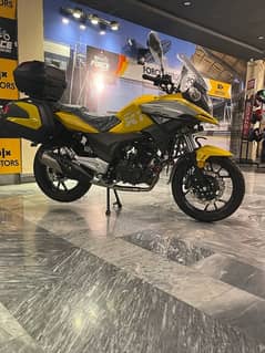 best touring bike in minimum price