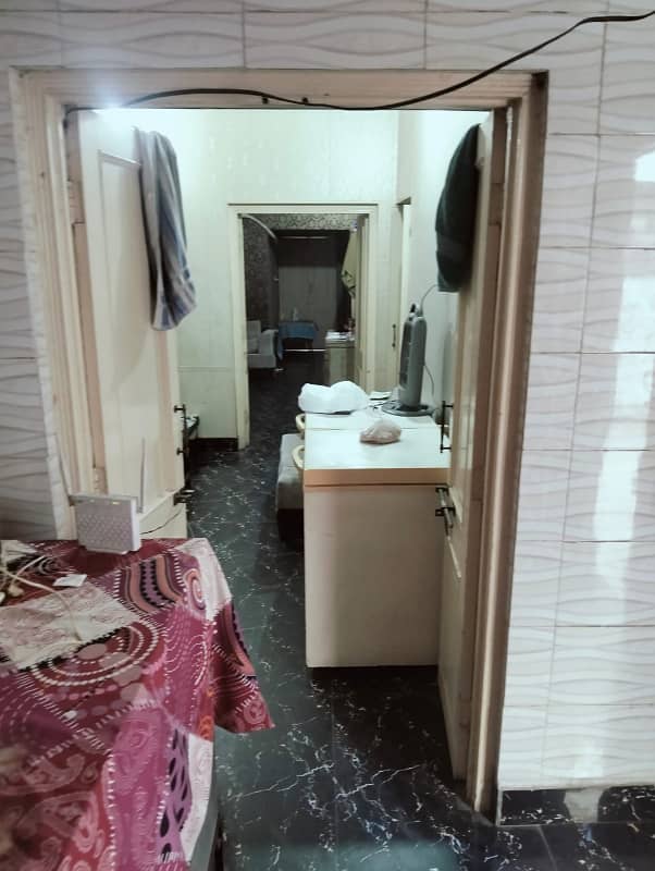 Ground Floor 4 Rooms 3 Washrooms Kitchen Car Parking near Dunya News Shaheen Complex Abbot Road near Shimla Hill Lahore 5