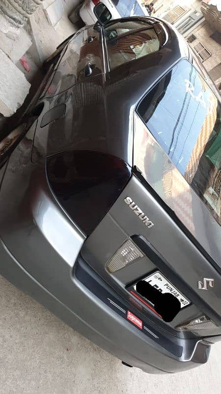 Suzuki Liana 2010 Model Lahore Registered total Genuine just sides 11