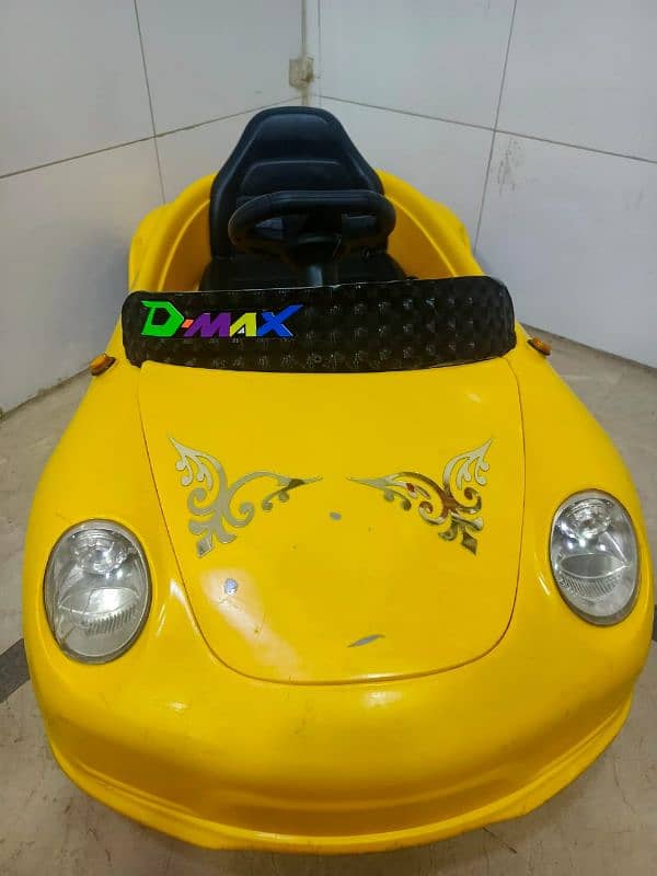 kids battery car (2 se 15 sal k bacho k lia) 1