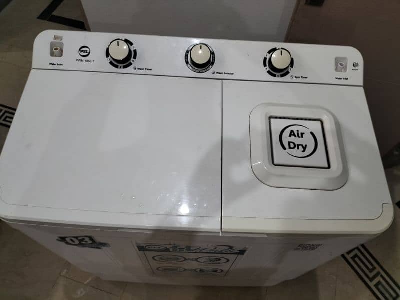 semi-automatic twin tub washing machine, model PWM-1050T. 1