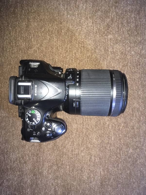 Nikon D5200 with Tamaron 18-200mm lens. 1