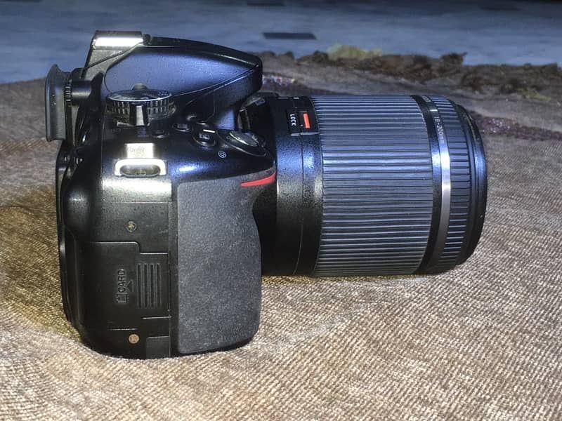 Nikon D5200 with Tamaron 18-200mm lens. 4