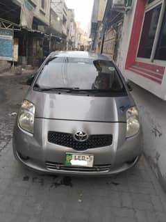 Toyota Vitz 2007 silver Lahore number bumper to bumper janin car