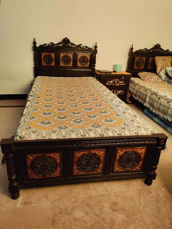 Wooden Chinioti Single beds excellent condition. . . 1