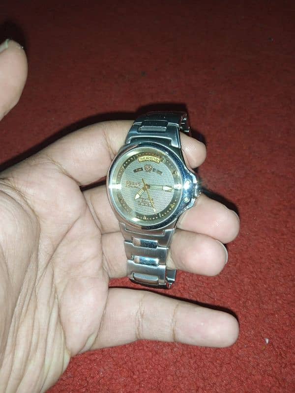 FULLY AUTOMATIC MOVEMENT WATCH WITH DAY AND DATE DISPLAY. 3