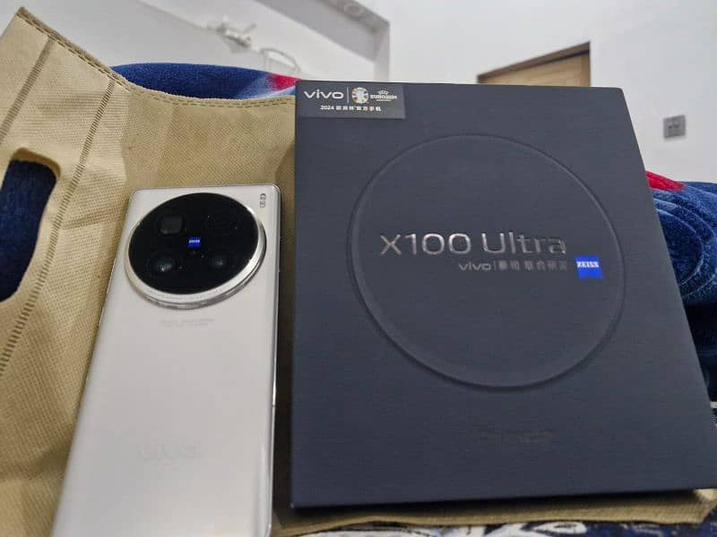 Vivo X 100 pro 5G 12/512 storage complete box urgent sale contact OLX 0