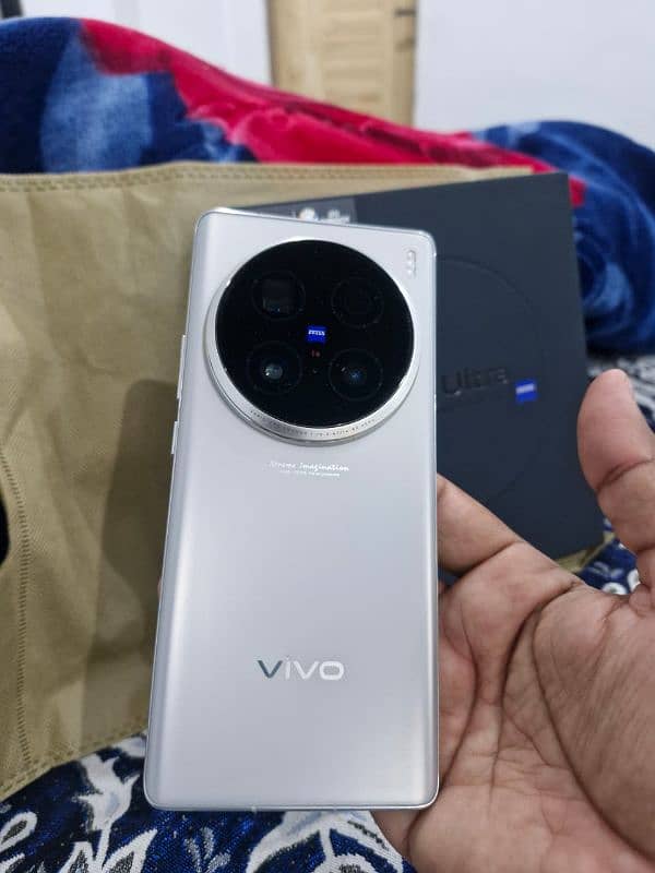 Vivo X 100 pro 5G 12/512 storage complete box urgent sale contact OLX 0