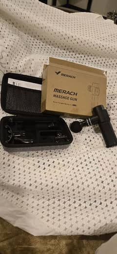 Brand new in box.  MERACH massage gun NANO . IMPORTED FROM USA