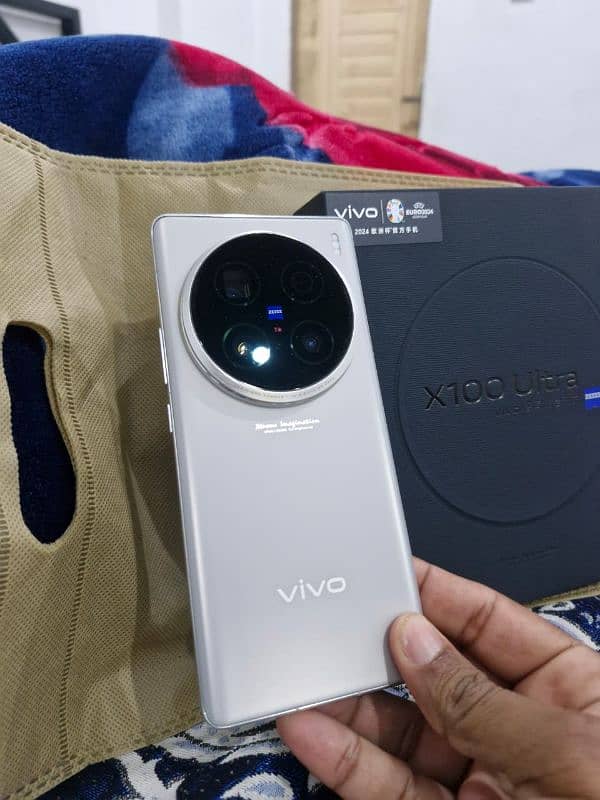 Vivo X 100 pro 5G 12/512 storage complete box urgent sale contact OLX 0