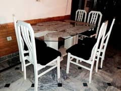 dining table with six chair glass top wooden