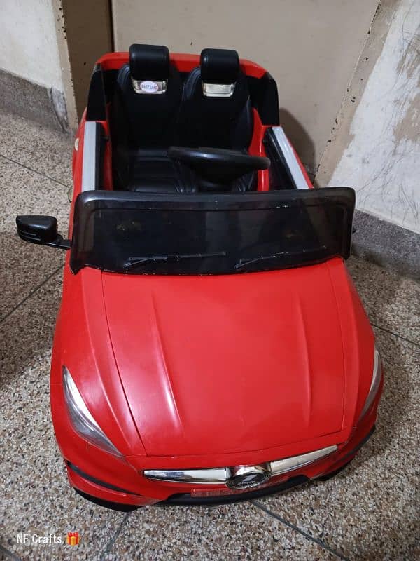 kids remote battery car / 2 seater 4