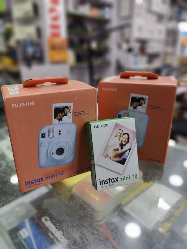 INSTA MINI 12 + FILM BOX ( ORIGINAL UNIT SEALD PACK ) 0