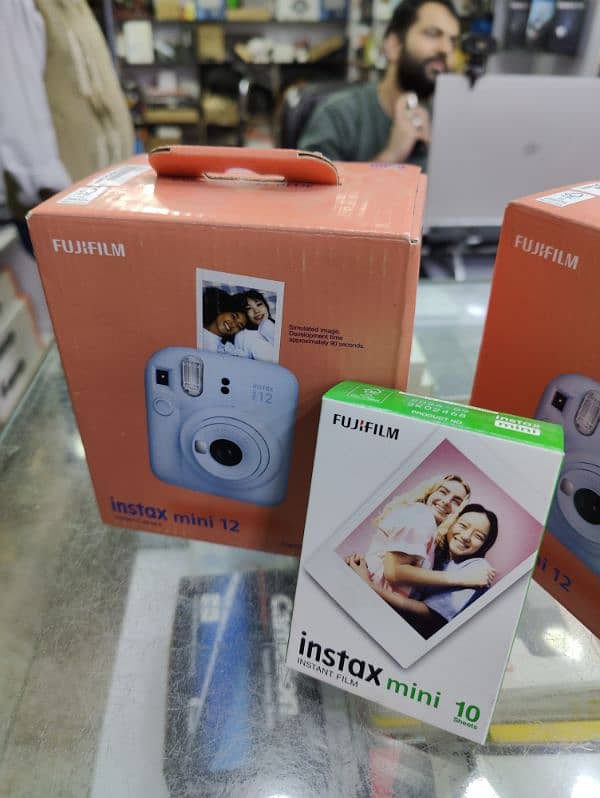 INSTA MINI 12 + FILM BOX ( ORIGINAL UNIT SEALD PACK ) 1