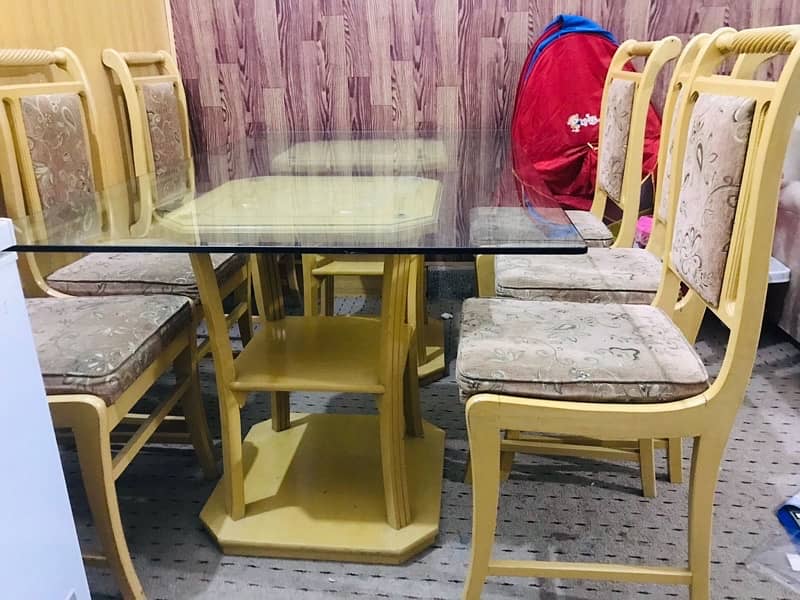 Glass Dinning table with 6 form chairs 1