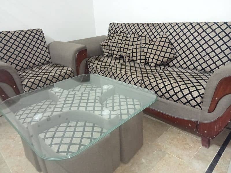 5 seater sofa set with cushions and table 8