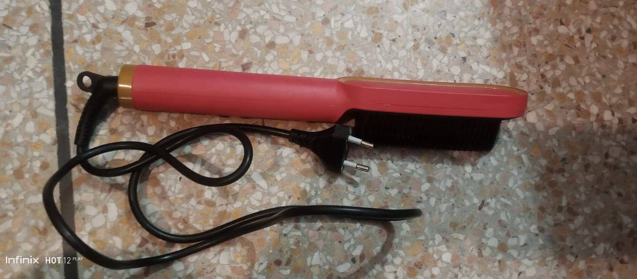 Electric hair straightening brush 2