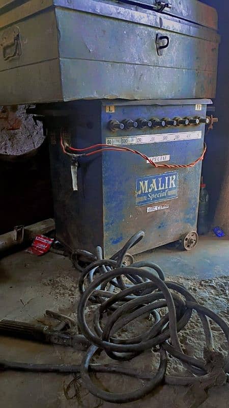 Verma machine sath mein kapde mein motor. welding plant 500 wat 5