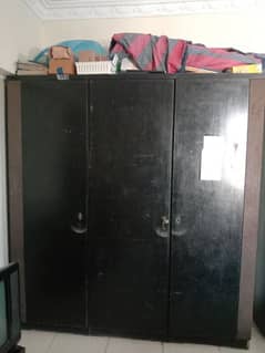 Three door wooden cupboard