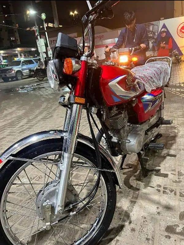 Honda cg 125 2022 good condition first owner karachi num 8