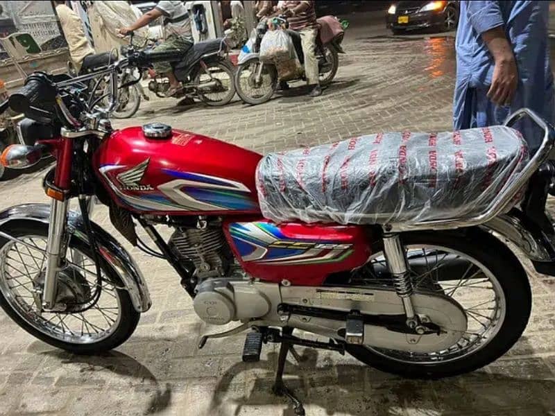 Honda cg 125 2022 good condition first owner karachi num 10