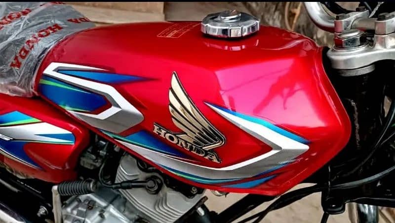 Honda cg 125 2022 good condition first owner karachi num 12