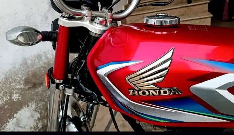 Honda cg 125 2022 good condition first owner karachi num 14