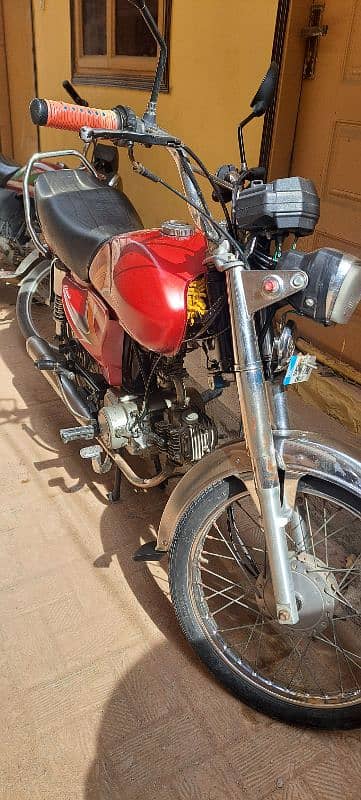 ROad prince 70cc red in good condition. . 1