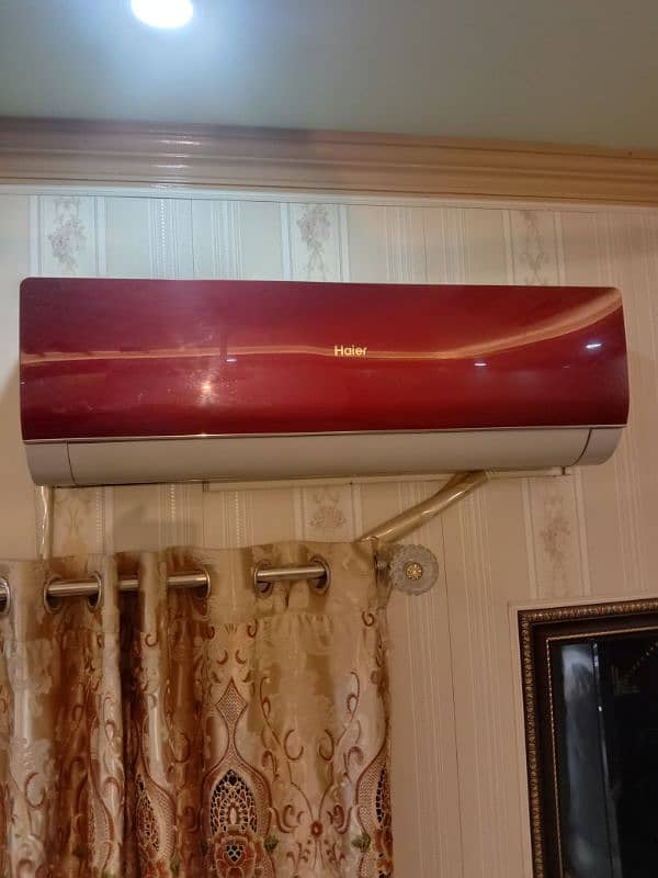 Haier. 1 ton split AC red colour 10 by 9 condition 0