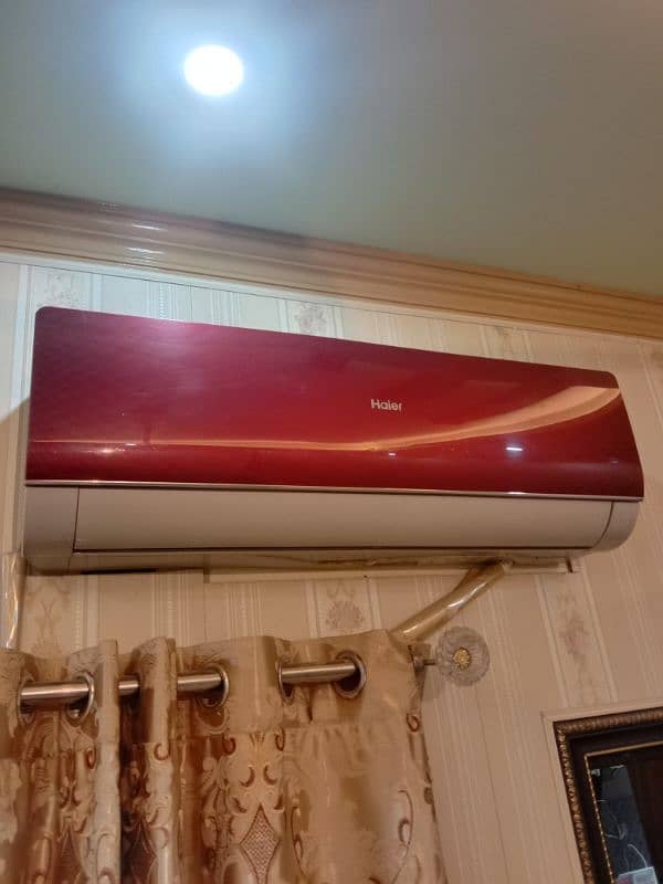 Haier. 1 ton split AC red colour 10 by 9 condition 1