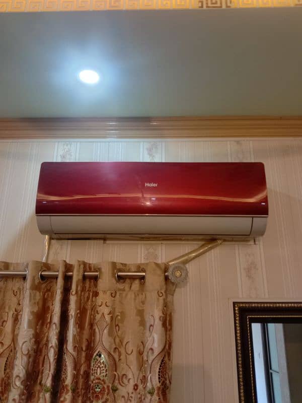 Haier. 1 ton split AC red colour 10 by 9 condition 2