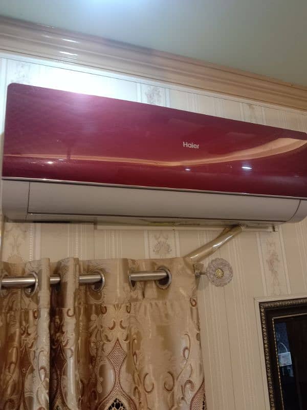 Haier. 1 ton split AC red colour 10 by 9 condition 3