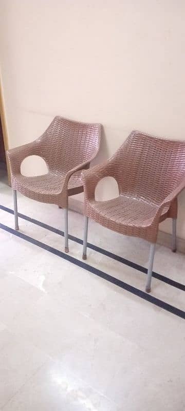 plastic brown colour chairs 700 each 2