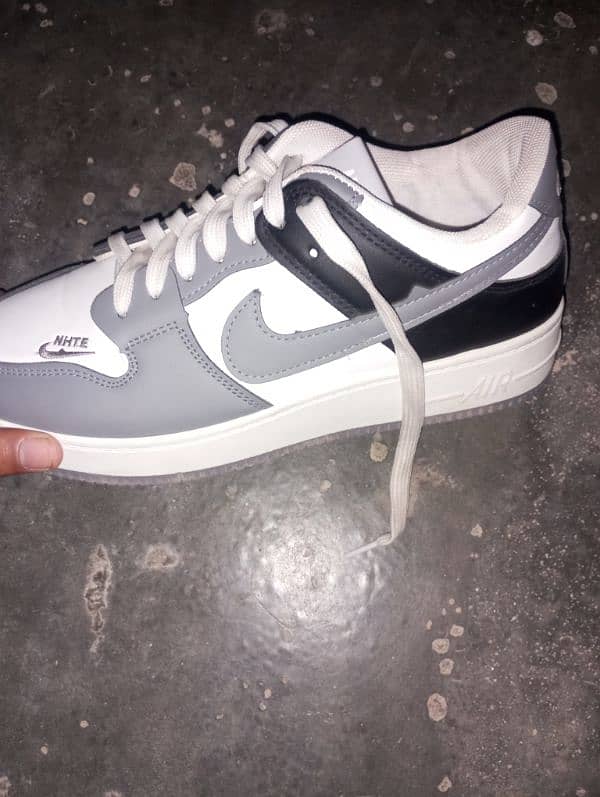 New brand Nike sneaker colour grey and  white one day use only 2