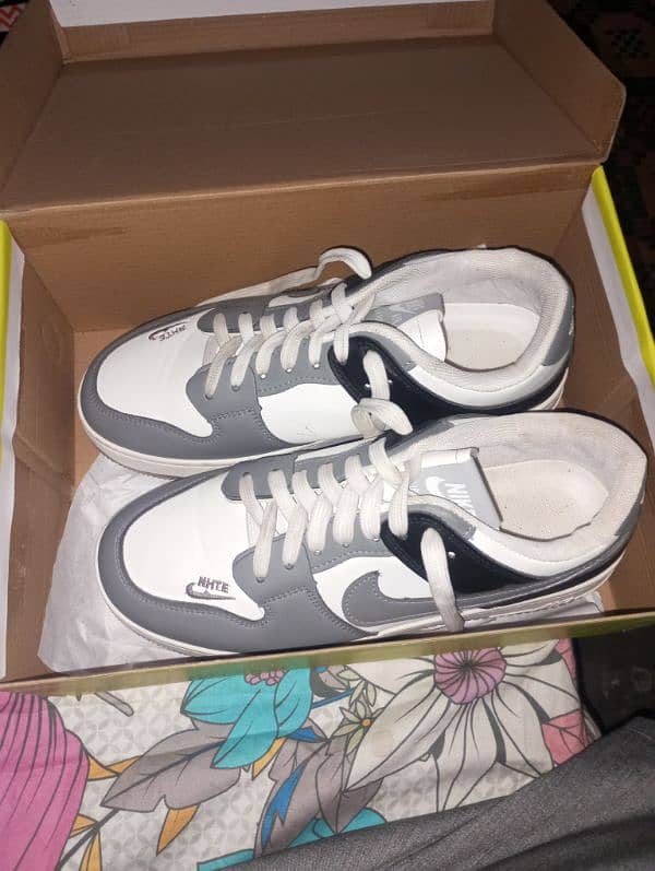 New brand Nike sneaker colour grey and  white one day use only 3