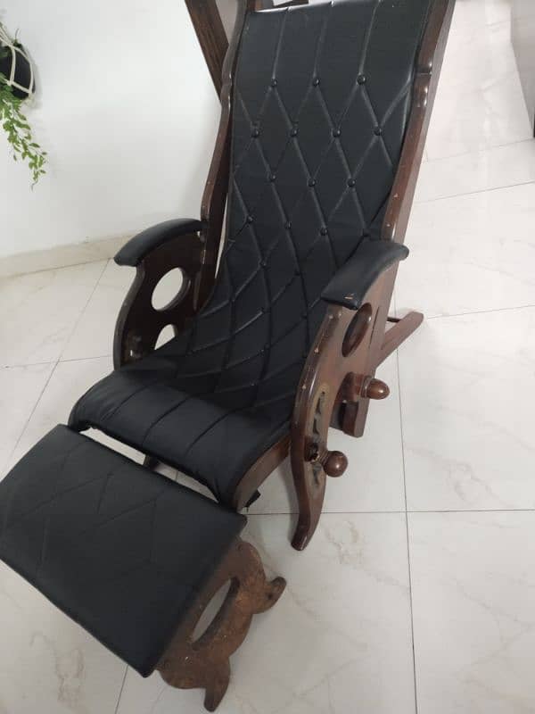 Wooden recliner with comfort stool 0