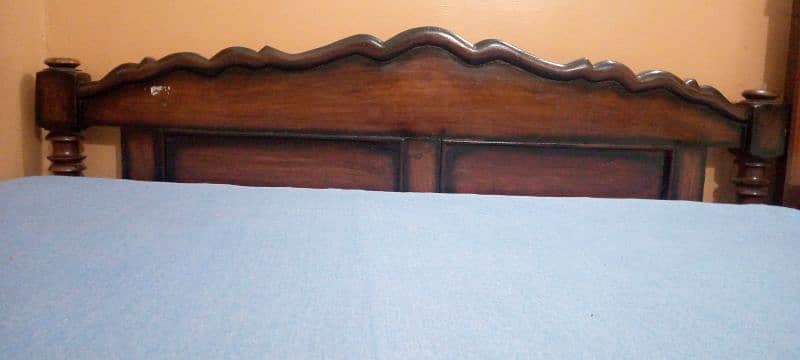 sheeshum wood double bed with matteress. . fixed price 1