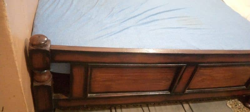 sheeshum wood double bed with matteress. . fixed price 2