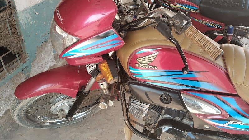 Honda prider 100cc red clr 0