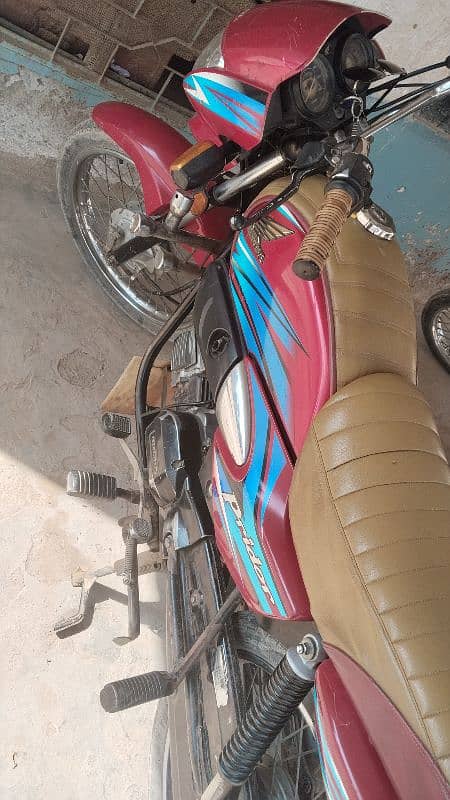 Honda prider 100cc red clr 1