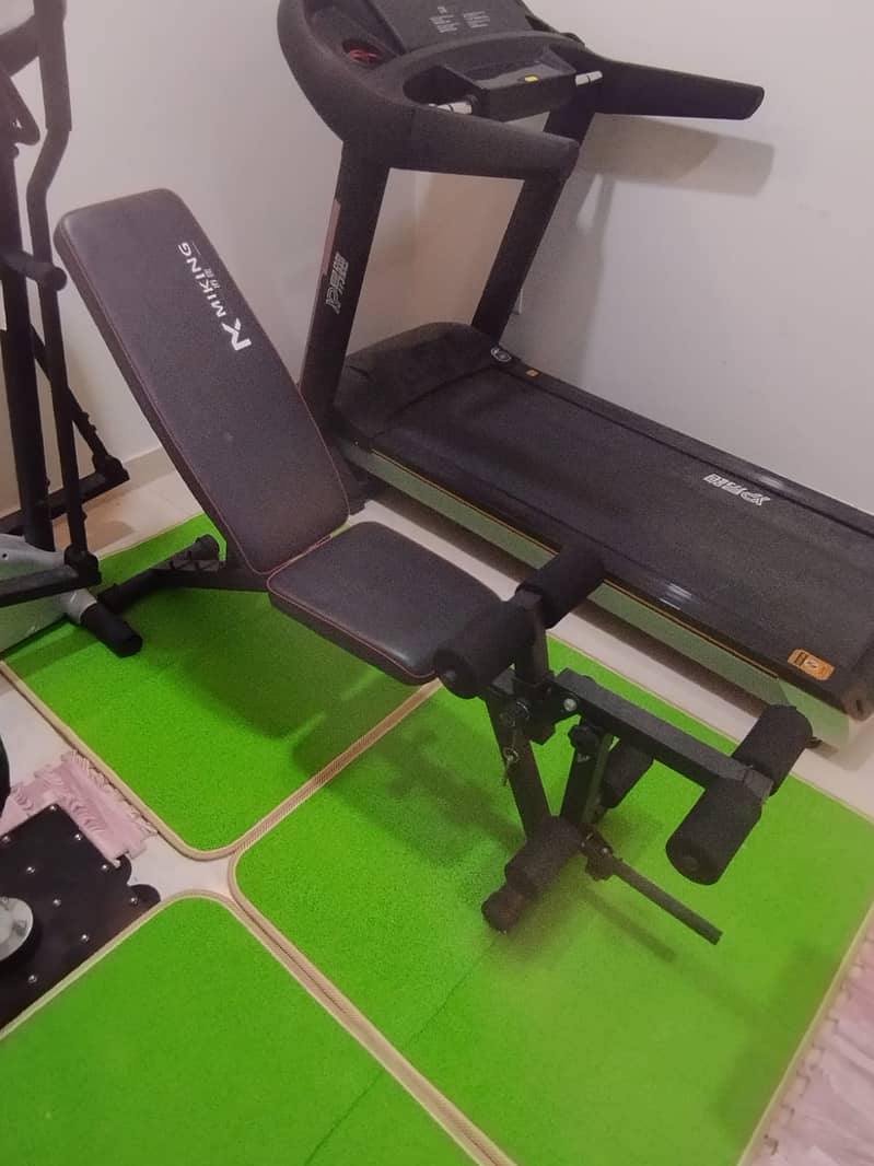 Treadmill elliptical multi gym bench and weights stands 5