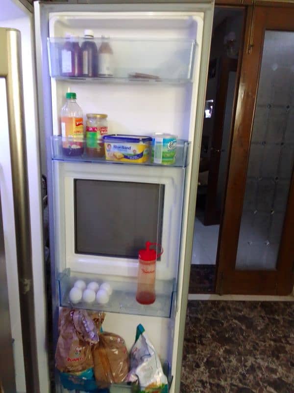 Fridge with ice cube maker and with touch screen 1