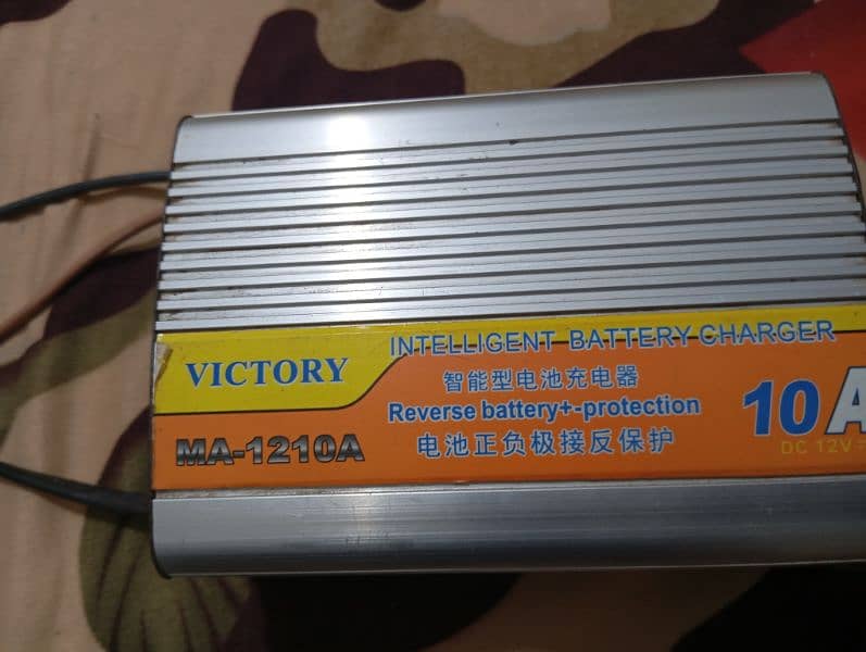 battery charger available 03056644979 4