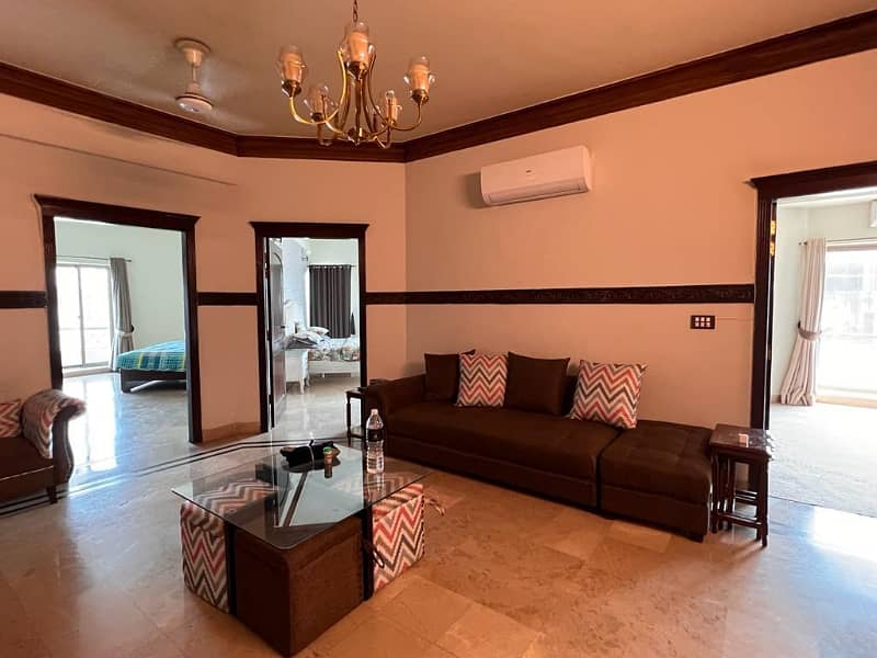 A luxurious 3-bedroom corner apartment is available for sale in F-11, featuring breathtaking Margalla-facing views. 9