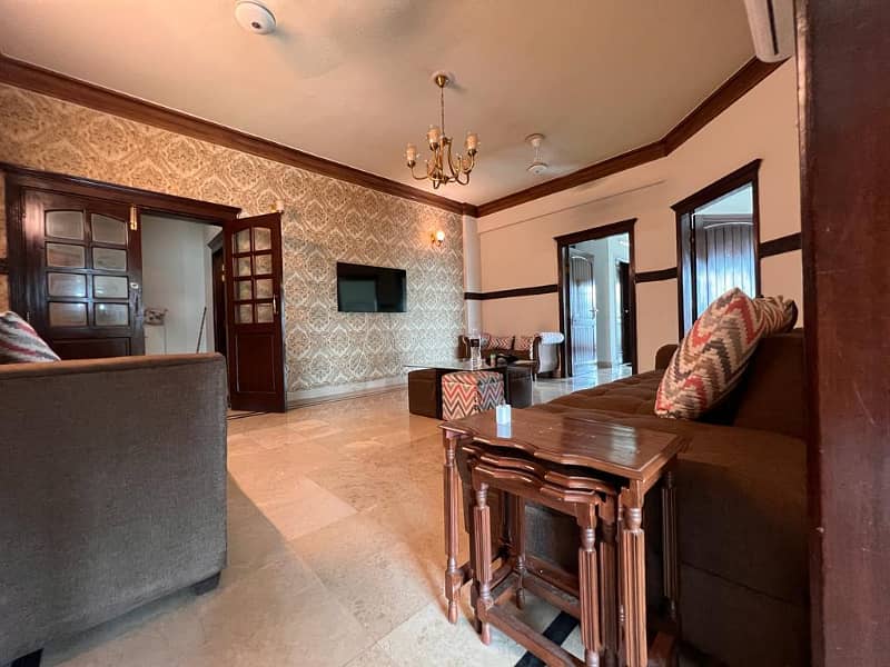 A luxurious 3-bedroom corner apartment is available for sale in F-11, featuring breathtaking Margalla-facing views. 10